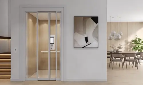 A home elevator with sleek white glass slim doors in a modern home.