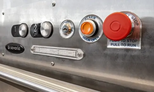 Safety features and buttons of the V-1504 vertical platform lift.