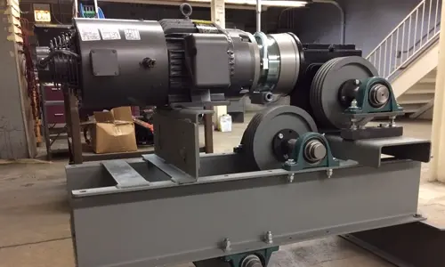 The gears and hardware behind the workings of a material lift.