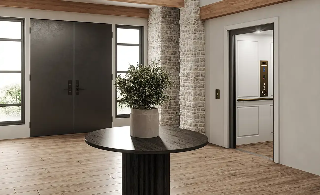 Luxury residential hallway featuring a modern home elevator with an open door, light interior cab, vertical control panel, stone accent walls, wood flooring, and contemporary architectural design.
