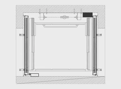 Technical drawing of an elevator shaft layout shown from a top-down view, including guide rails, structural walls, and mechanical components.