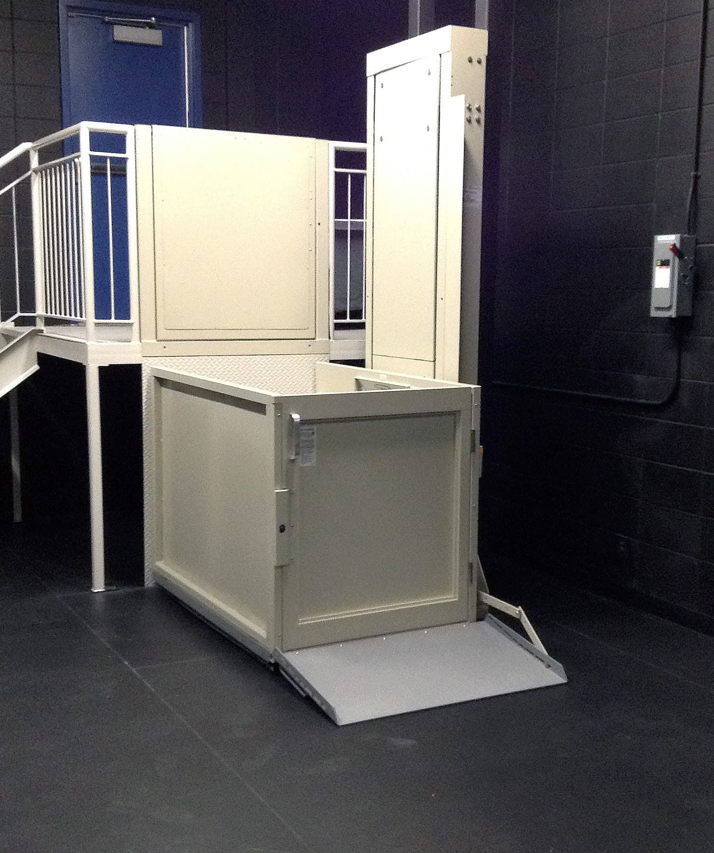 V-1504 Vertical Platform Lift in a garage